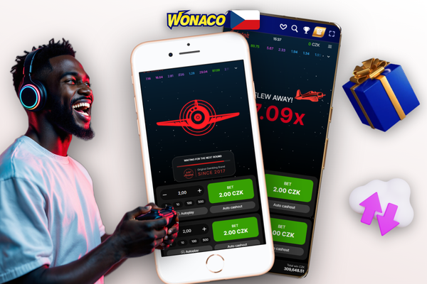 Klíčový okamžik Aviator online ve Wonaco Casino – prst nad Cash Out při multiplikátoru 1,85x